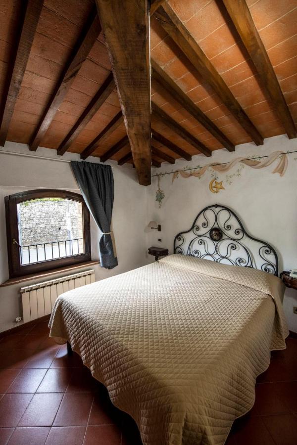 Hotel Vecchia Oliviera Монтальчино Экстерьер фото